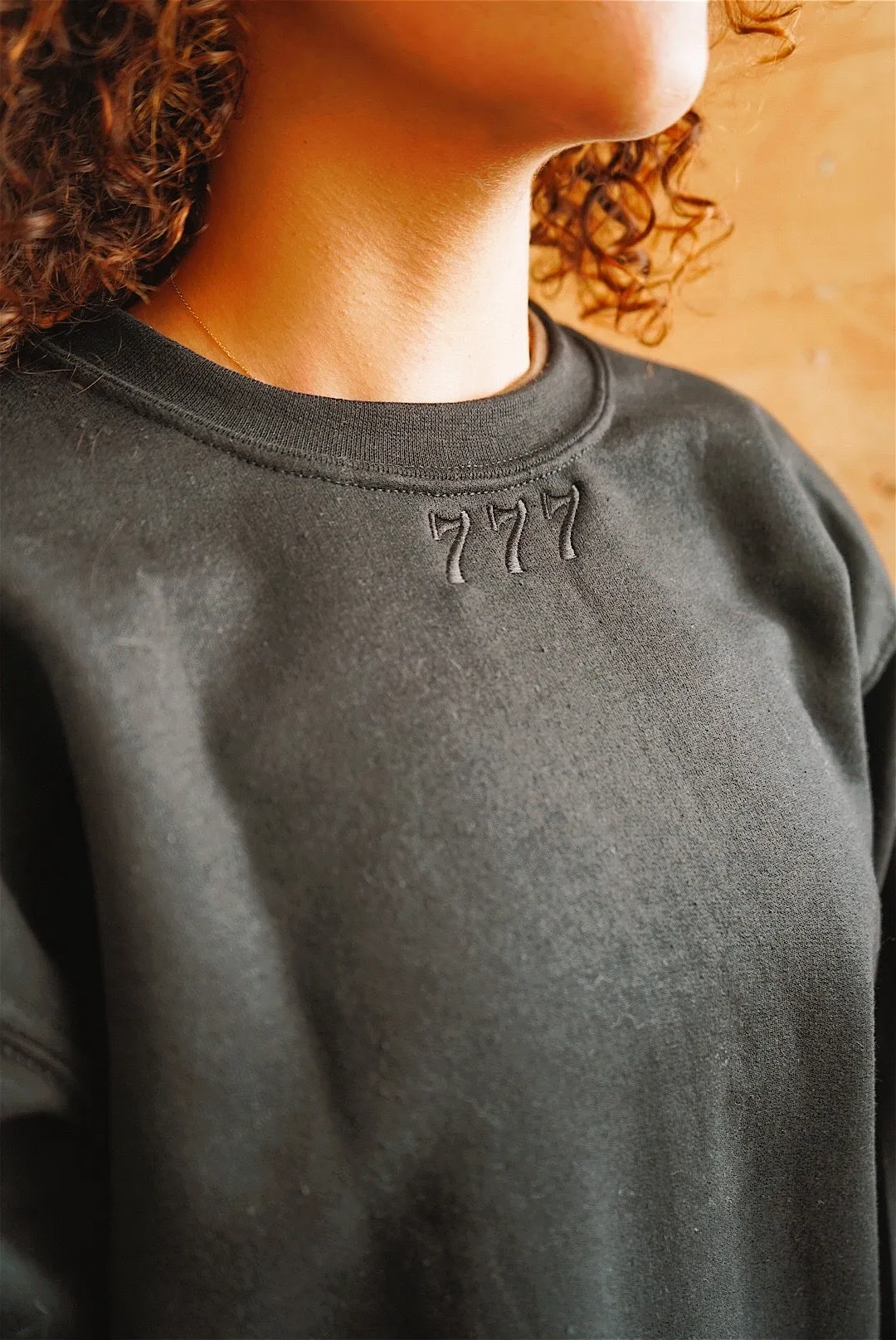 777 black pullover