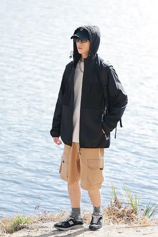 Solid Color Windbreaker for Men Featuring Zippered Pockets and Patch Pocket